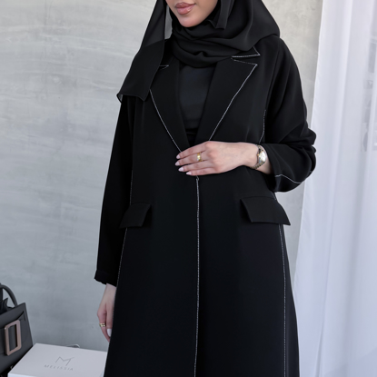 صورة بليزر بخياطات تطريز بارزة